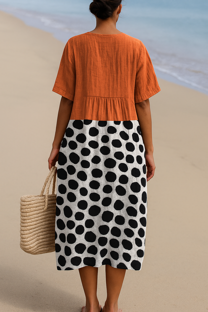 Maëlle | Orange Dress Featuring Bold Polka Dots